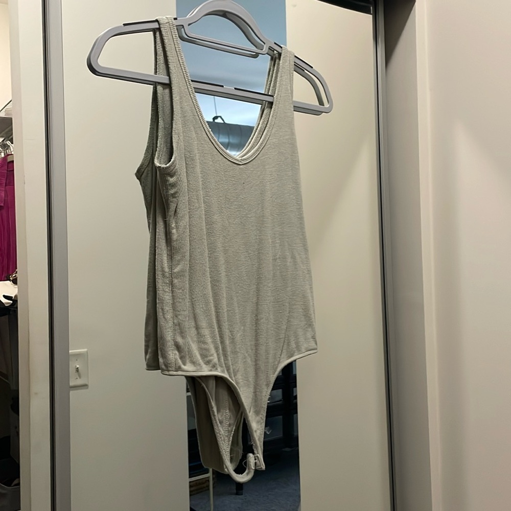 Lightly worn sage green v-neck bodysuit, size M
